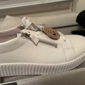 Gabor White Leather Sneakers.  They run large. they are  more like a size 9